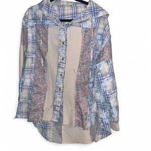 Pol Blue and white floral patchwork hooded button down shirt with a relaxed fit.
